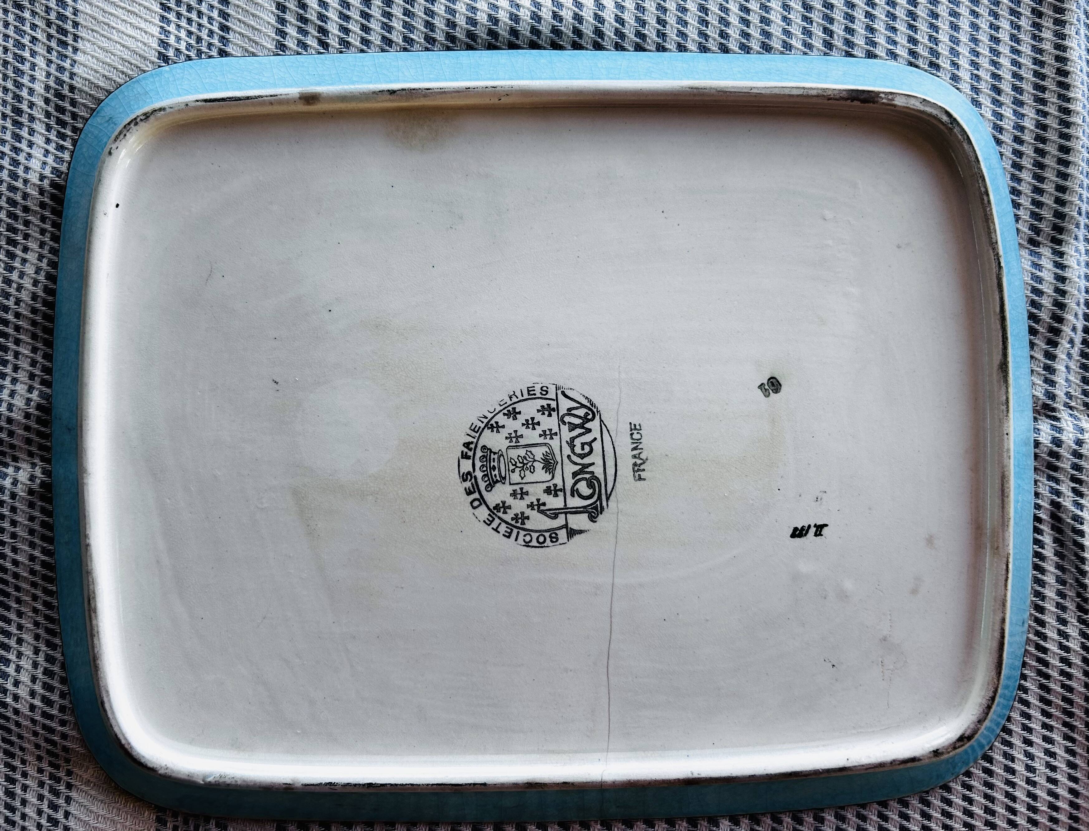 Complete set of Longwy earthenware.