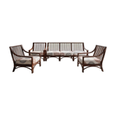 Salon vintage Maison Maugrion en rotin et finitions cuir et plume