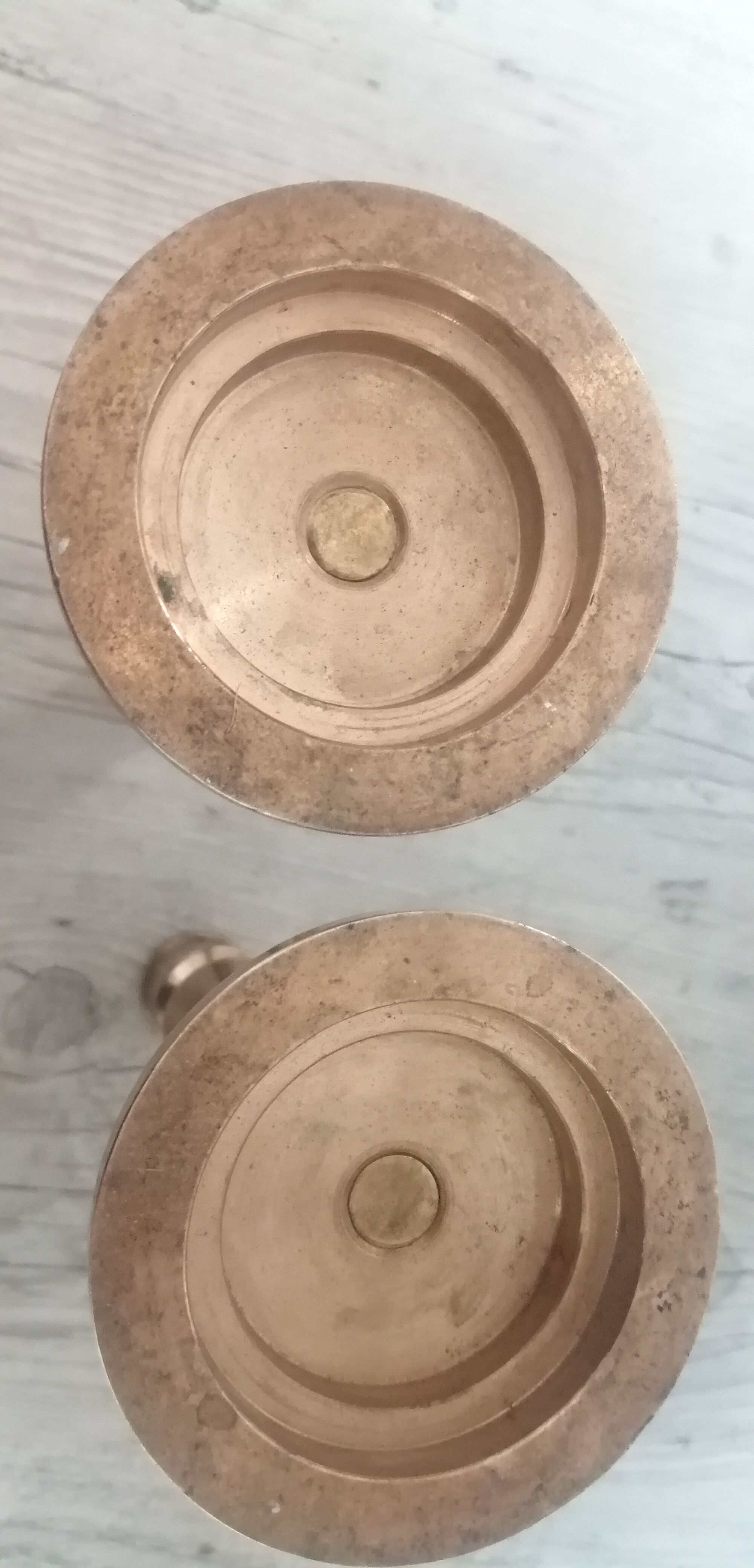 Pair of antique brass candleholders