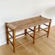 Vintage bench in wood and straw