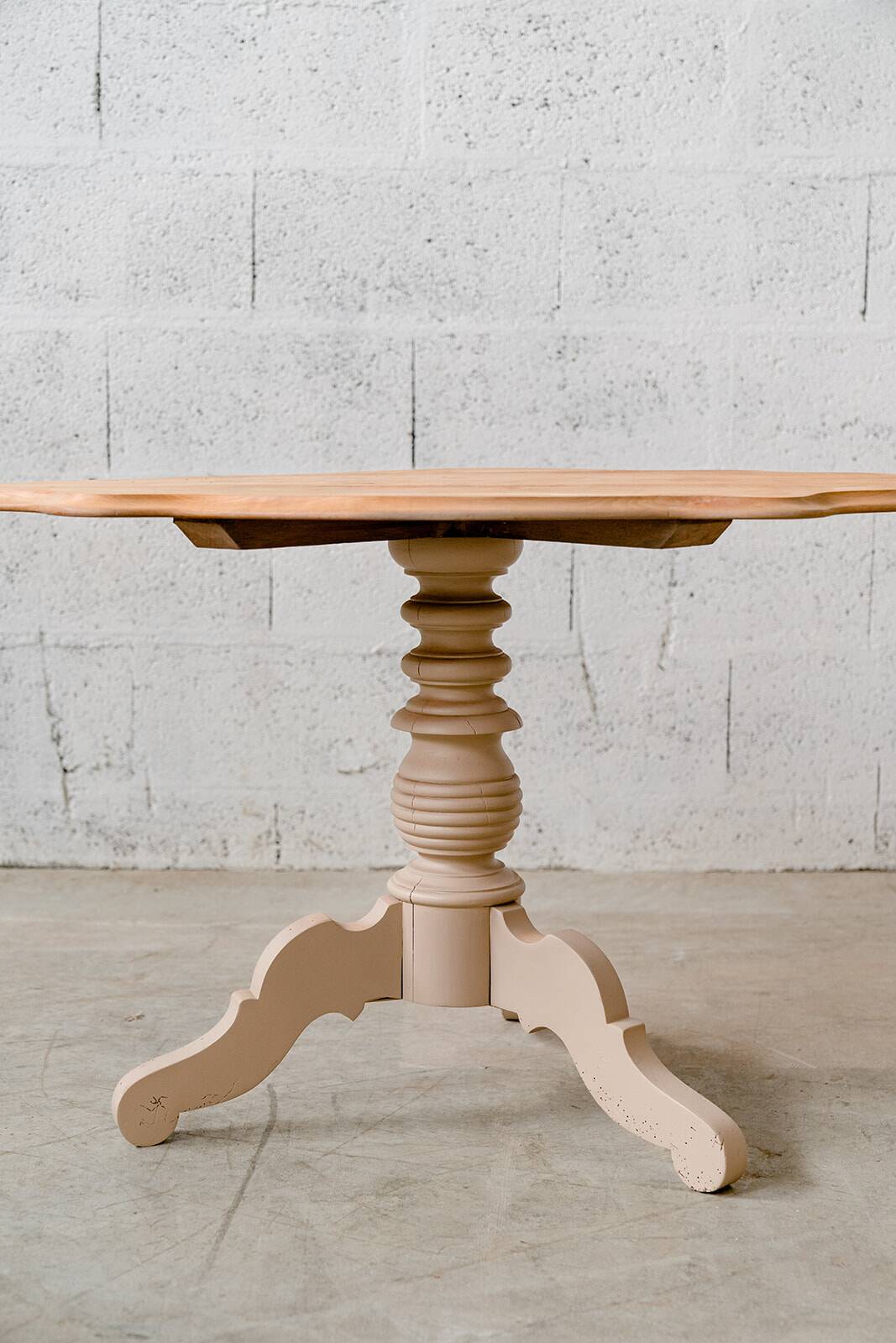 Old wooden pedestal table