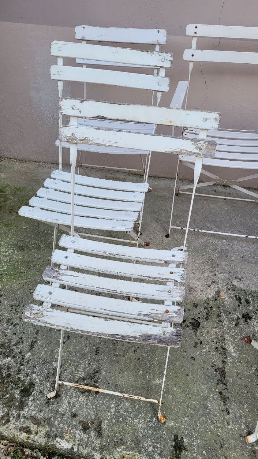Series of 6 chairs and 1 folding armchair of iron garden bistro