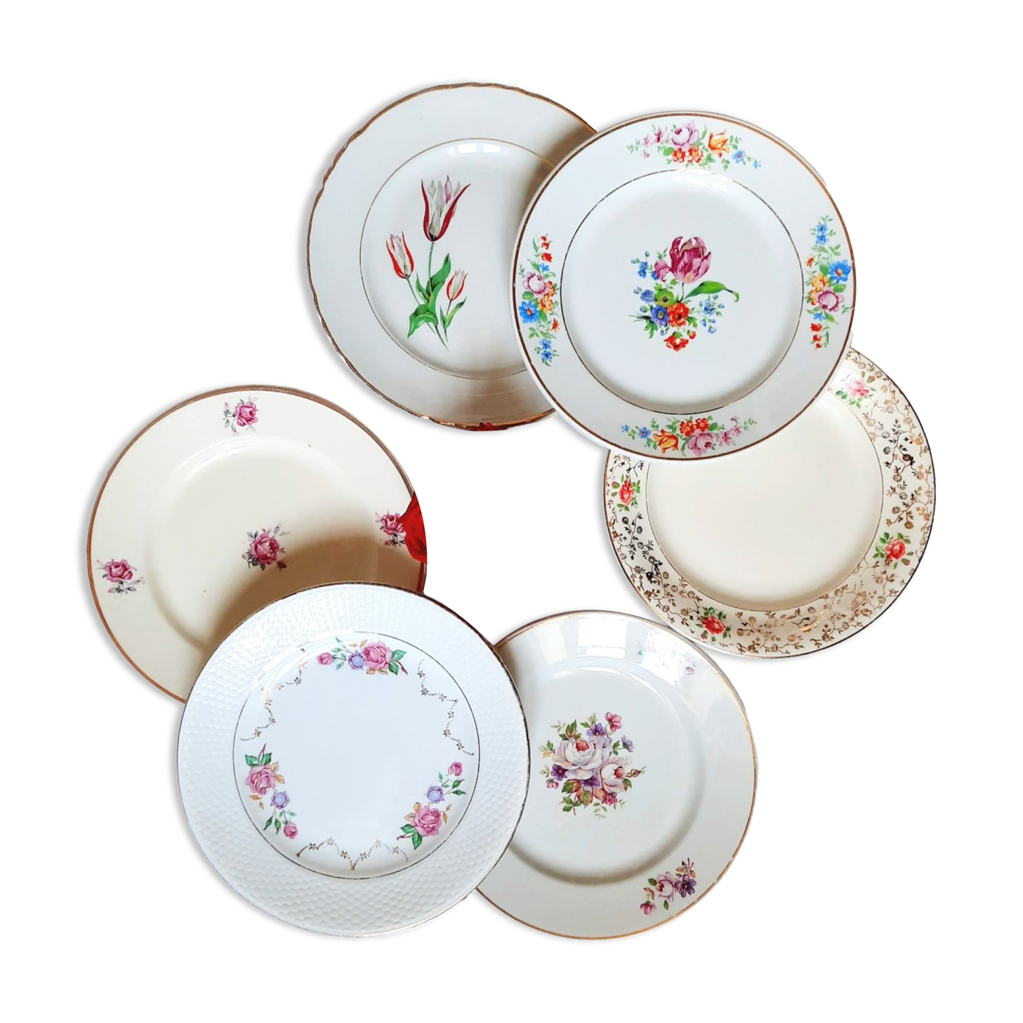 Antique dessert plates mismatched in earthenware with gilded edges
