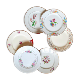 Antique dessert plates mismatched in earthenware with gilded edges