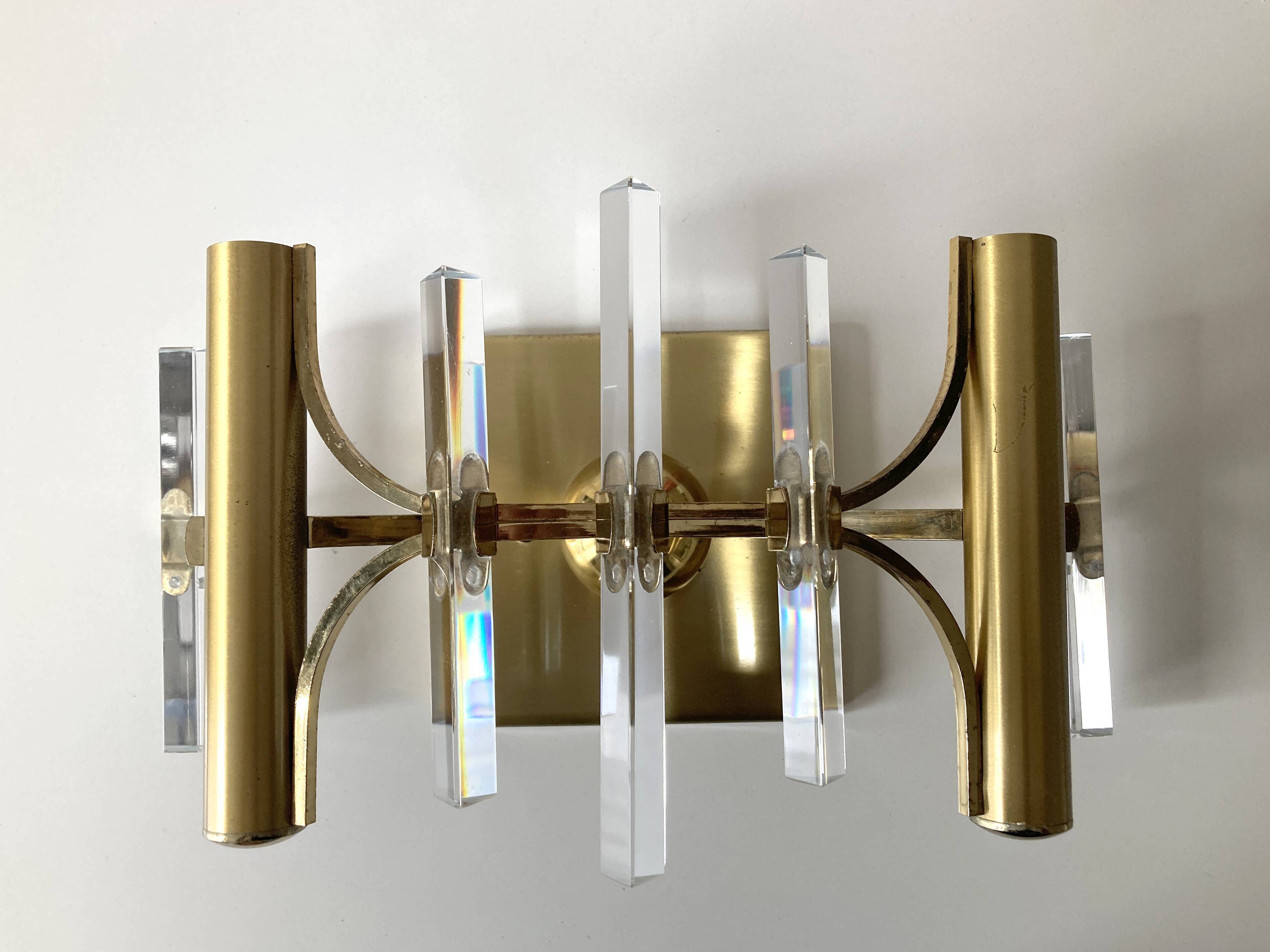Golden wall lamp and glass crystals. 1970