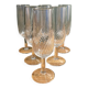 6 clear glass champagne flutes in very good condition