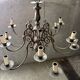 Antique chandelier in tin or bronze, Art Deco style, 12 light branches.