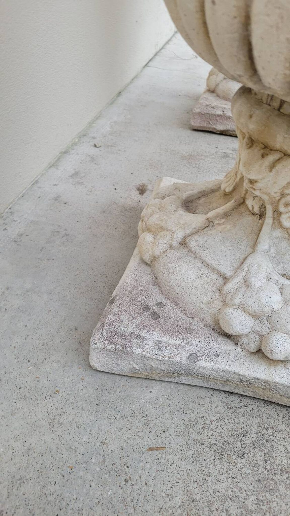 Pair of planter vases decorated with faces in reconstituted stone 1950s
