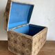 Domed chest in domino paper, 19th century.