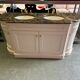 Classic double bathroom cabinet with marble top and gold fittings
