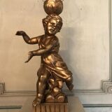 Deux enfants en bois sculpté doré, lampes de table