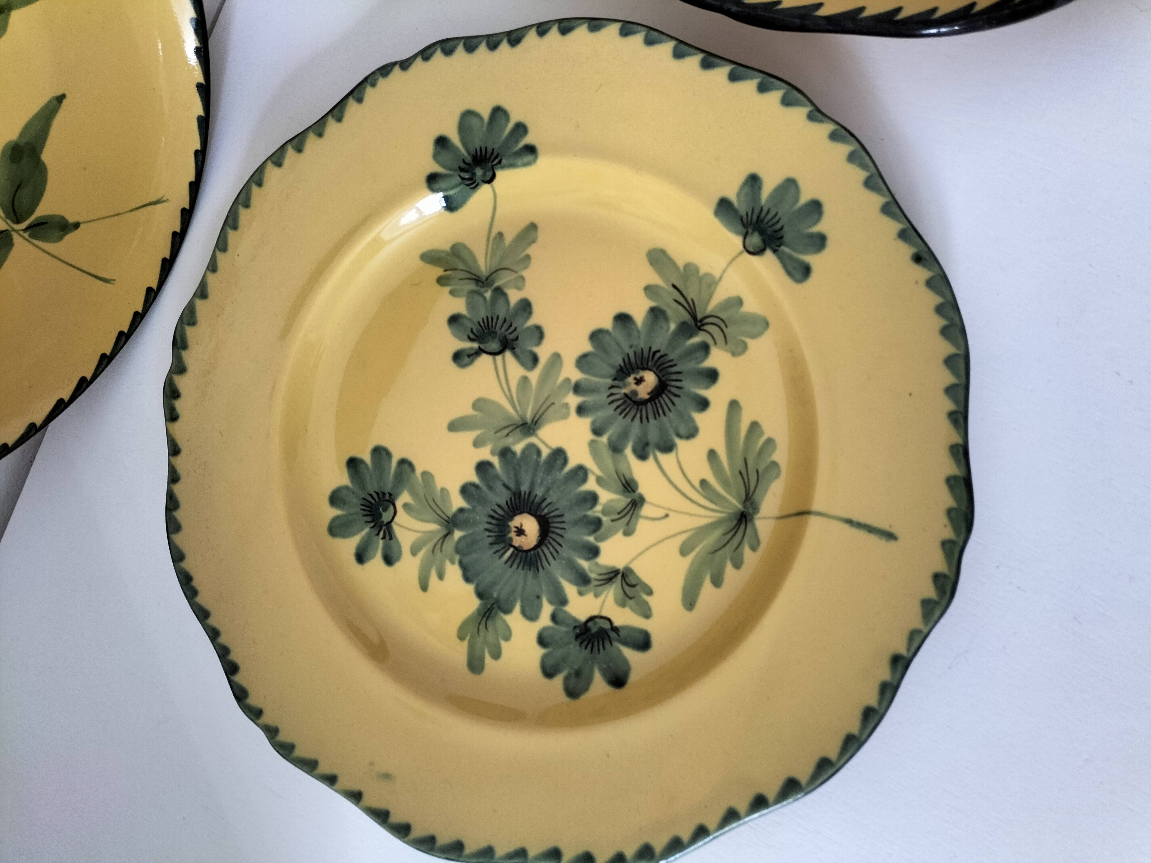 4 antique plates in hand-painted faience