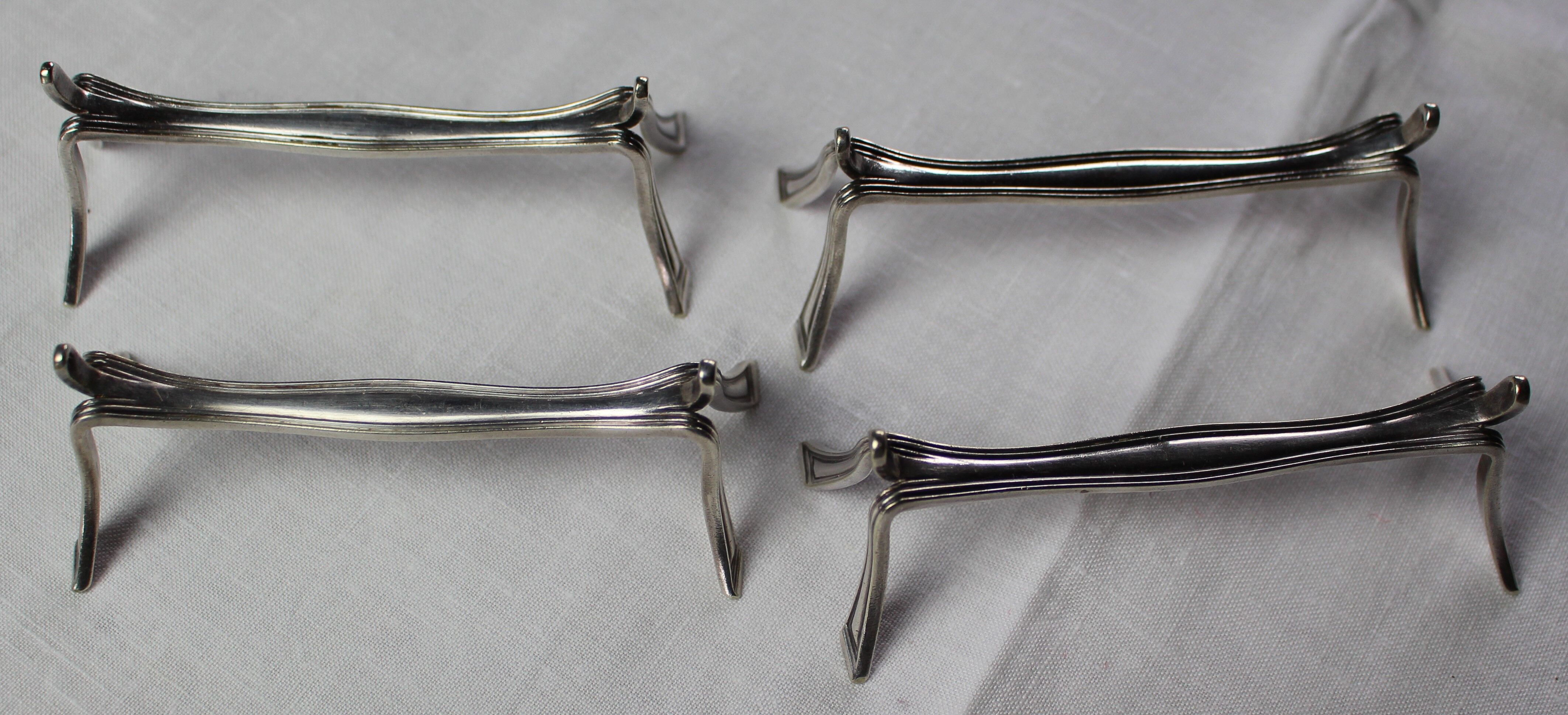 Lot of 4 silver metal knife holders "Christofle"