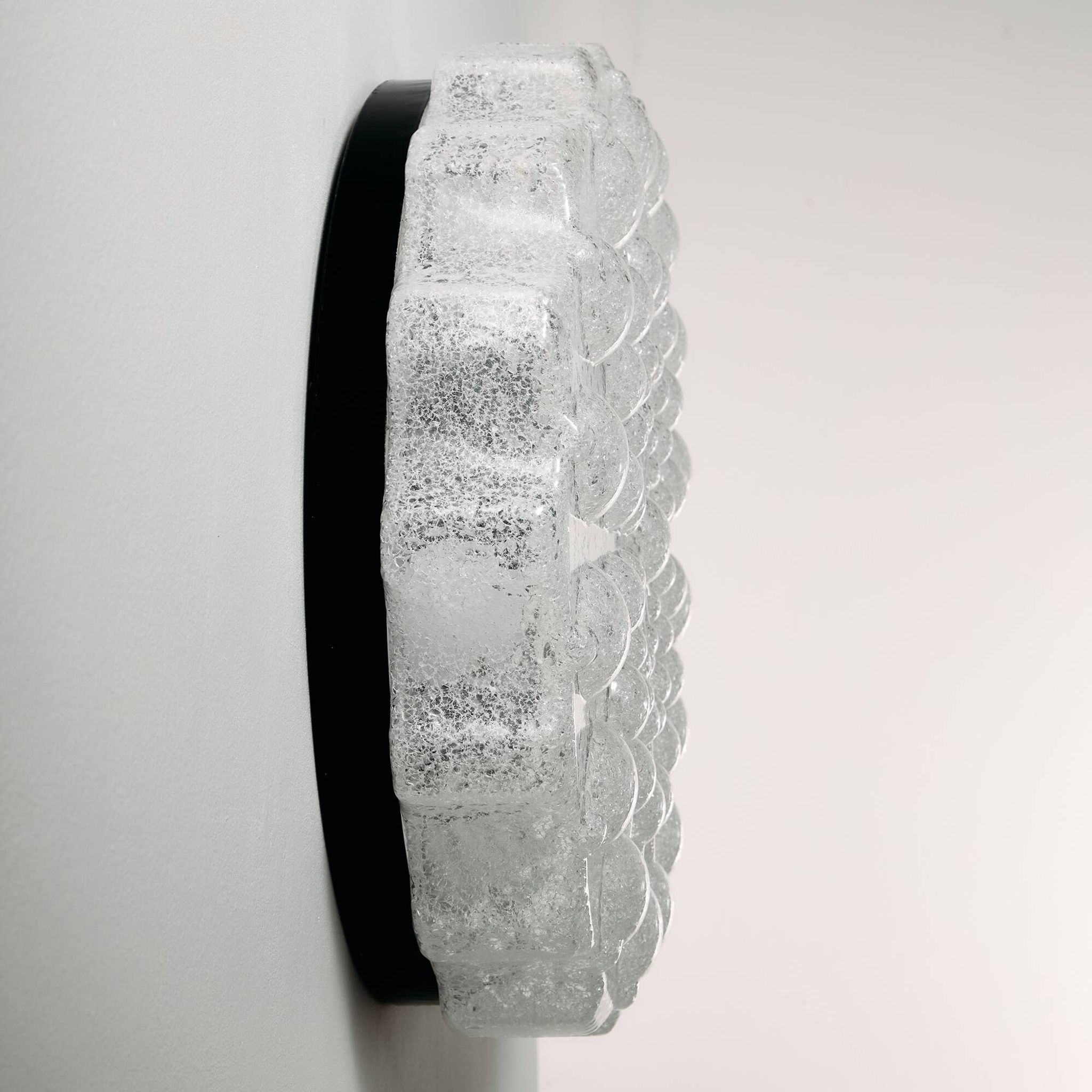Wall light in metal and plastic