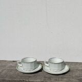 Pair of vintage Apilco style bistro cups in white and green ceramic