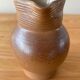 Pitcher in glazed sandstone