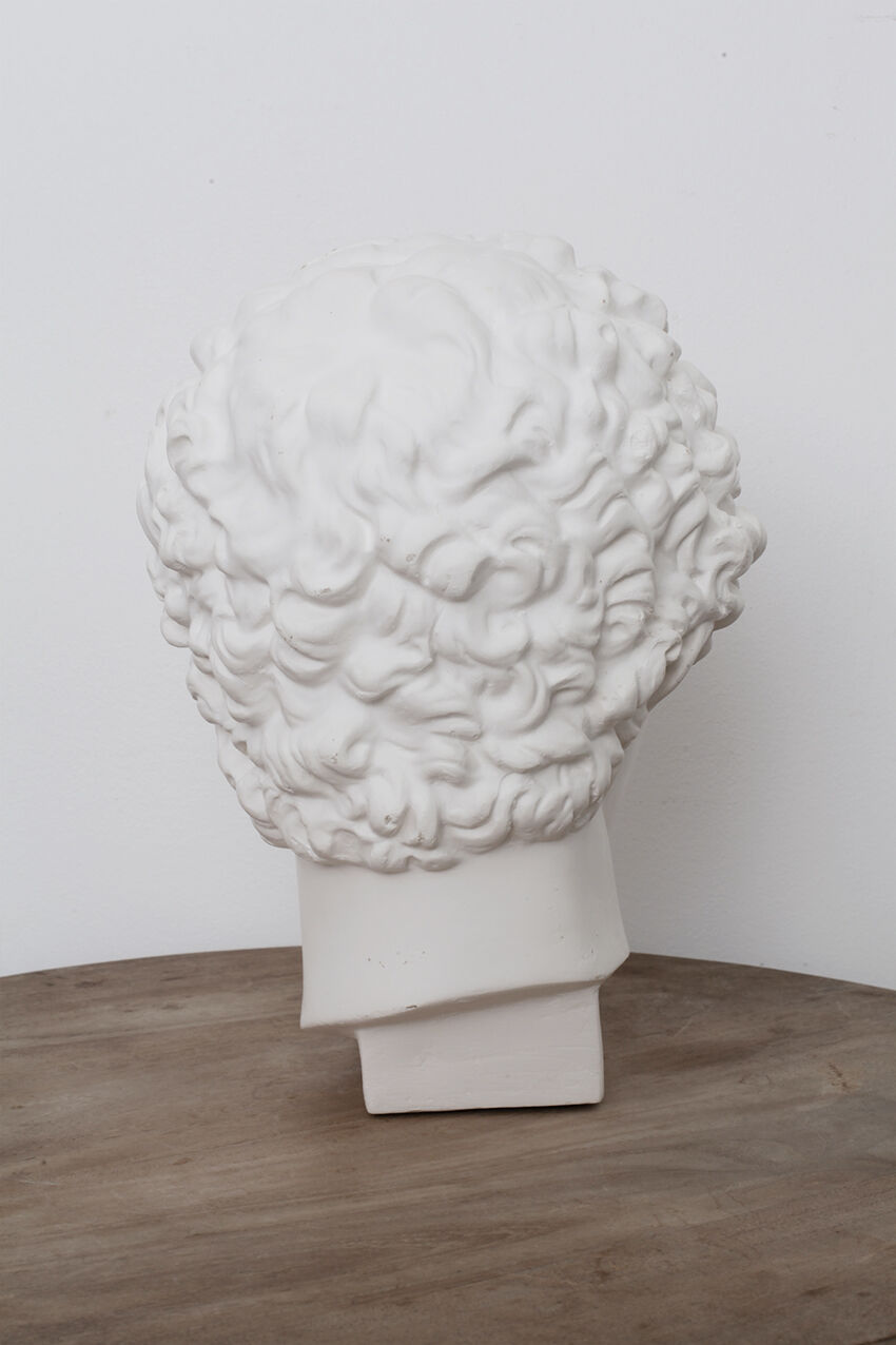 Greek head in matt white plaster