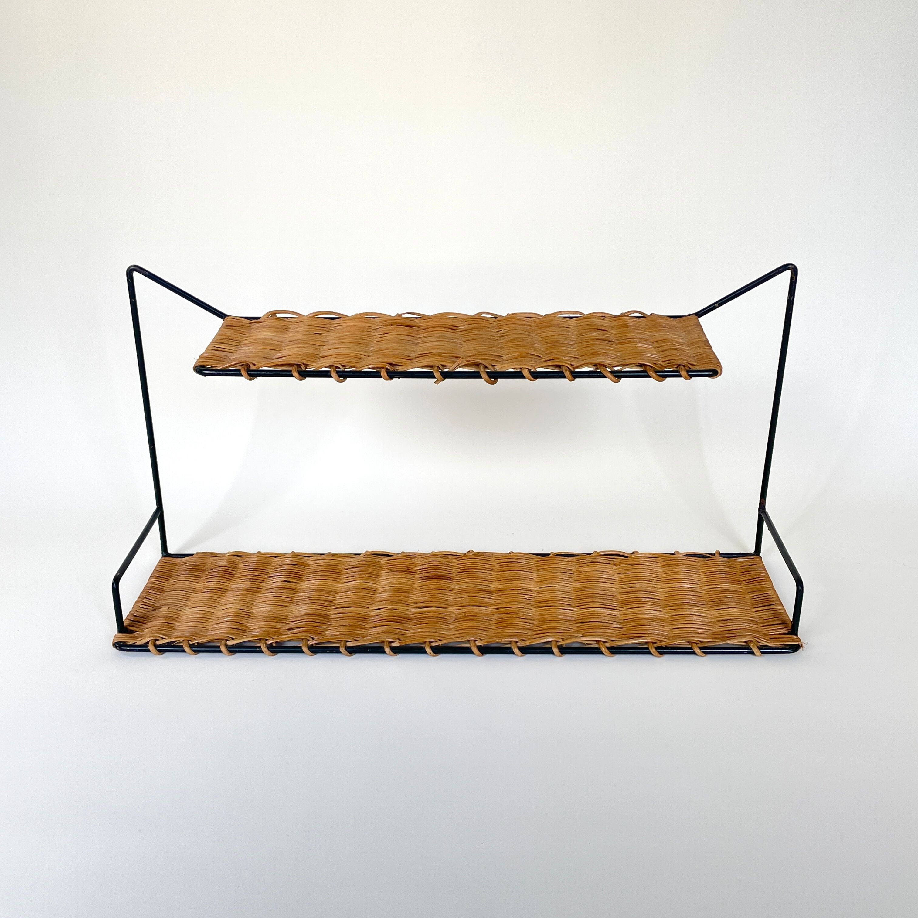 Pair of Raoul Guys wall shelves, 1950