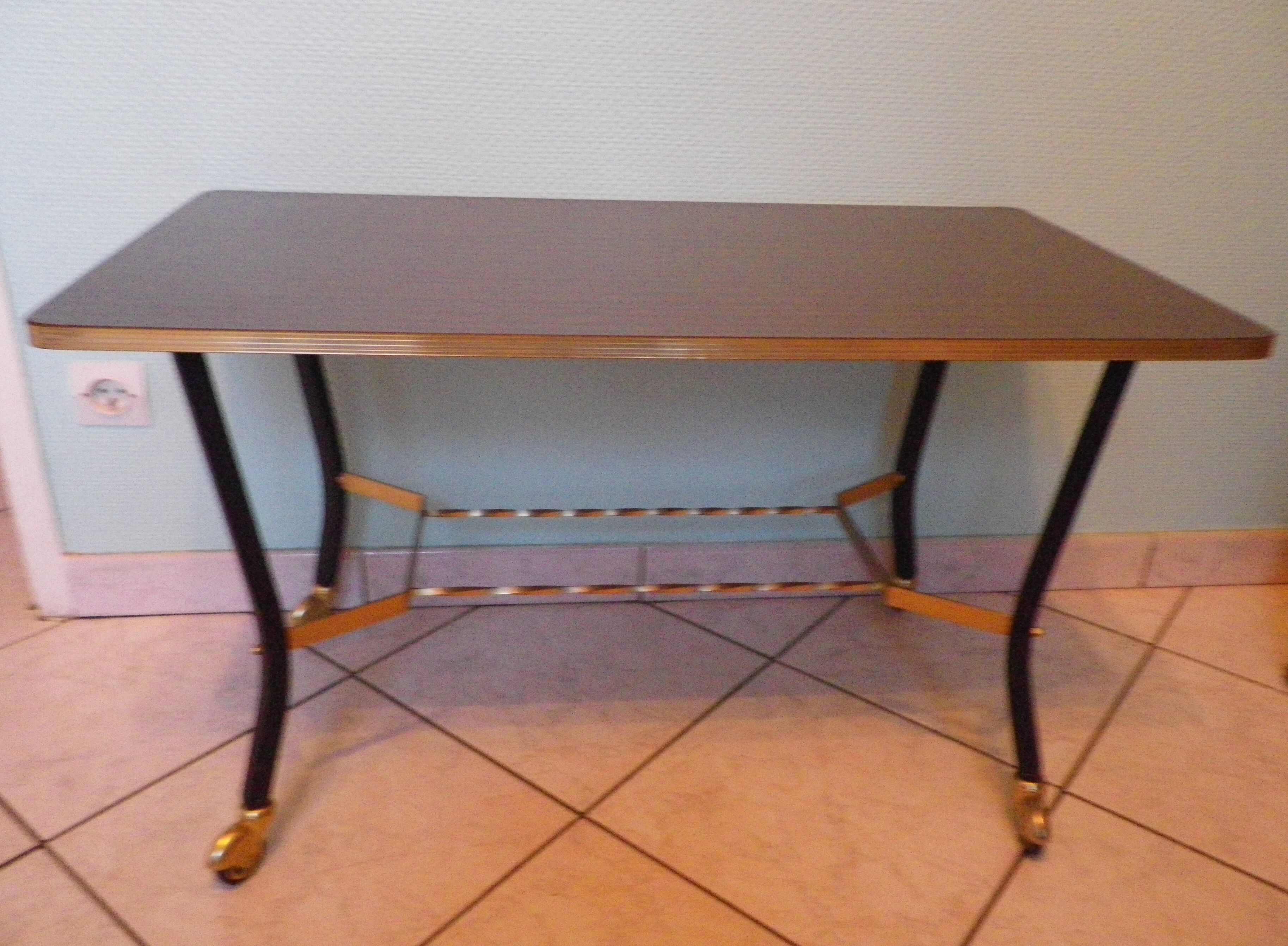 Lounge table, side table on wheels, formica top, gold and black metal
