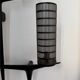 Pair of sculpted lacquered bronze wall lights, Arlus