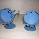 Pair of candle holders, blue torches