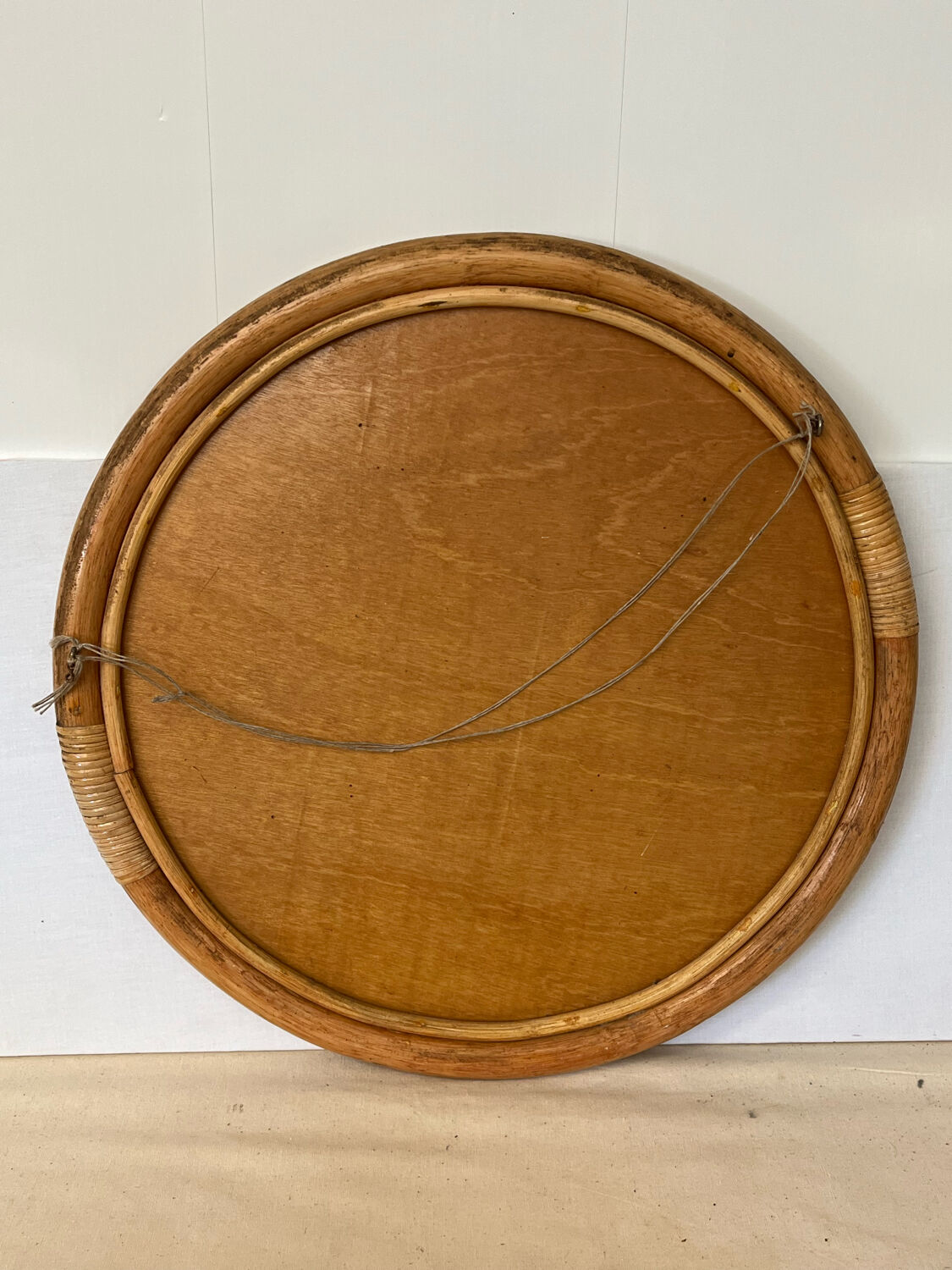 Round rattan mirror