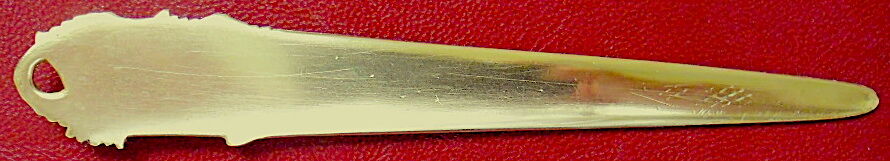 Bronze paper cutter decorated with trendy hazelnuts