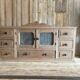 Small piece of furniture with glass doors and drawers