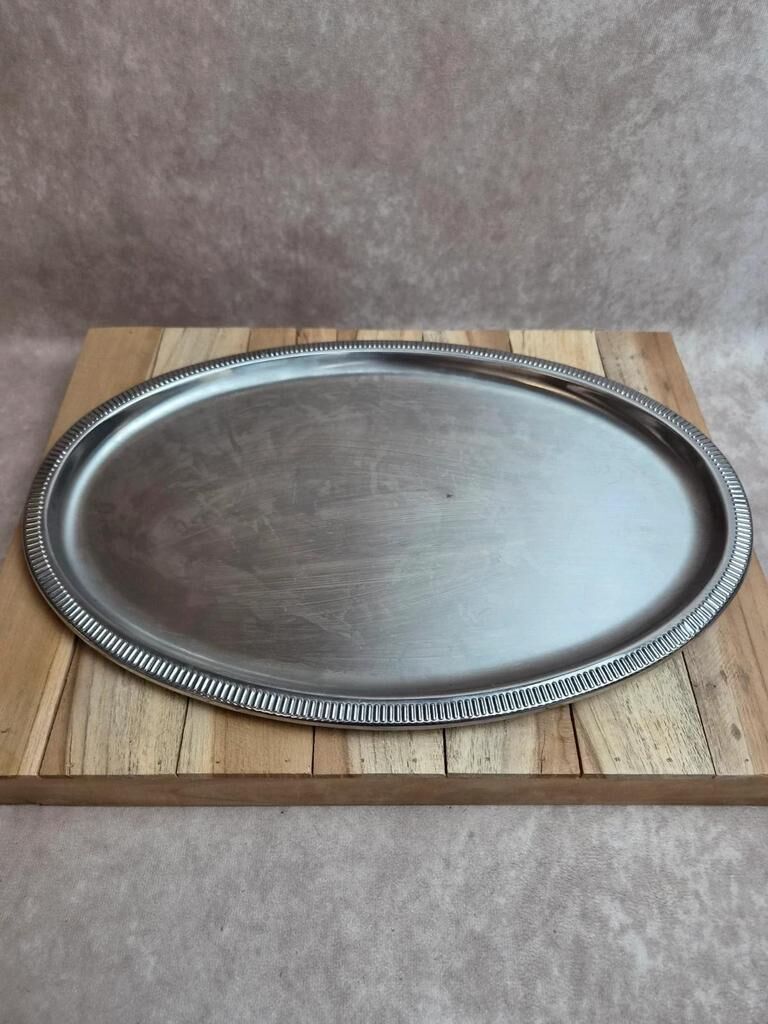Vintage silver-plated metal tray with a segmented glass aperitif dish.
