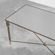 Table basse en laiton patiné et verre Maison Charles années 1960