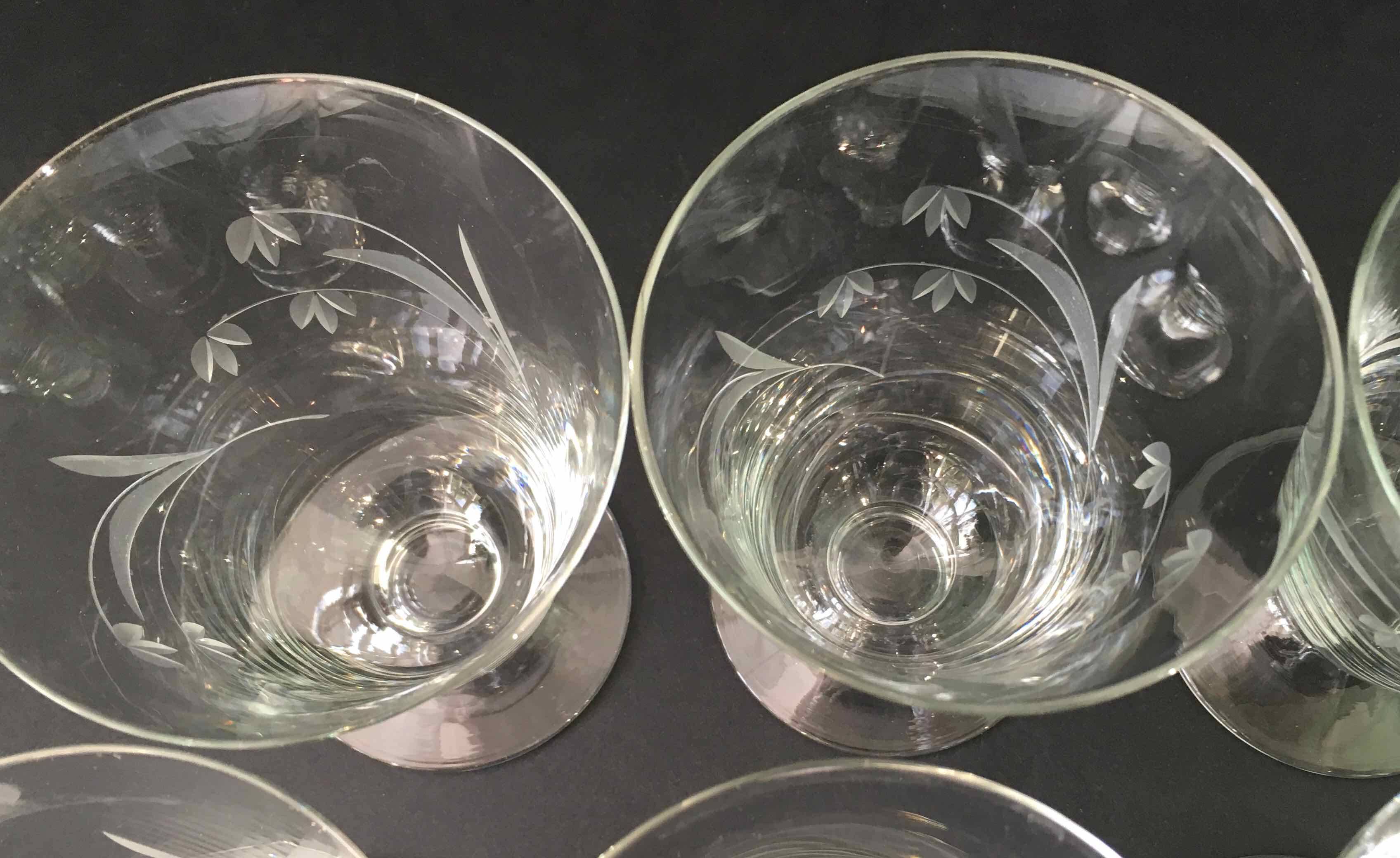 6 wine glasses carved with lily of the valley sprigs