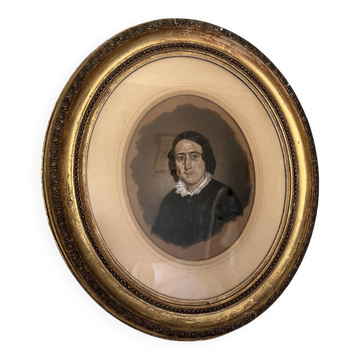 Framed old portrait of a woman.