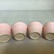 Four double pink candlesticks