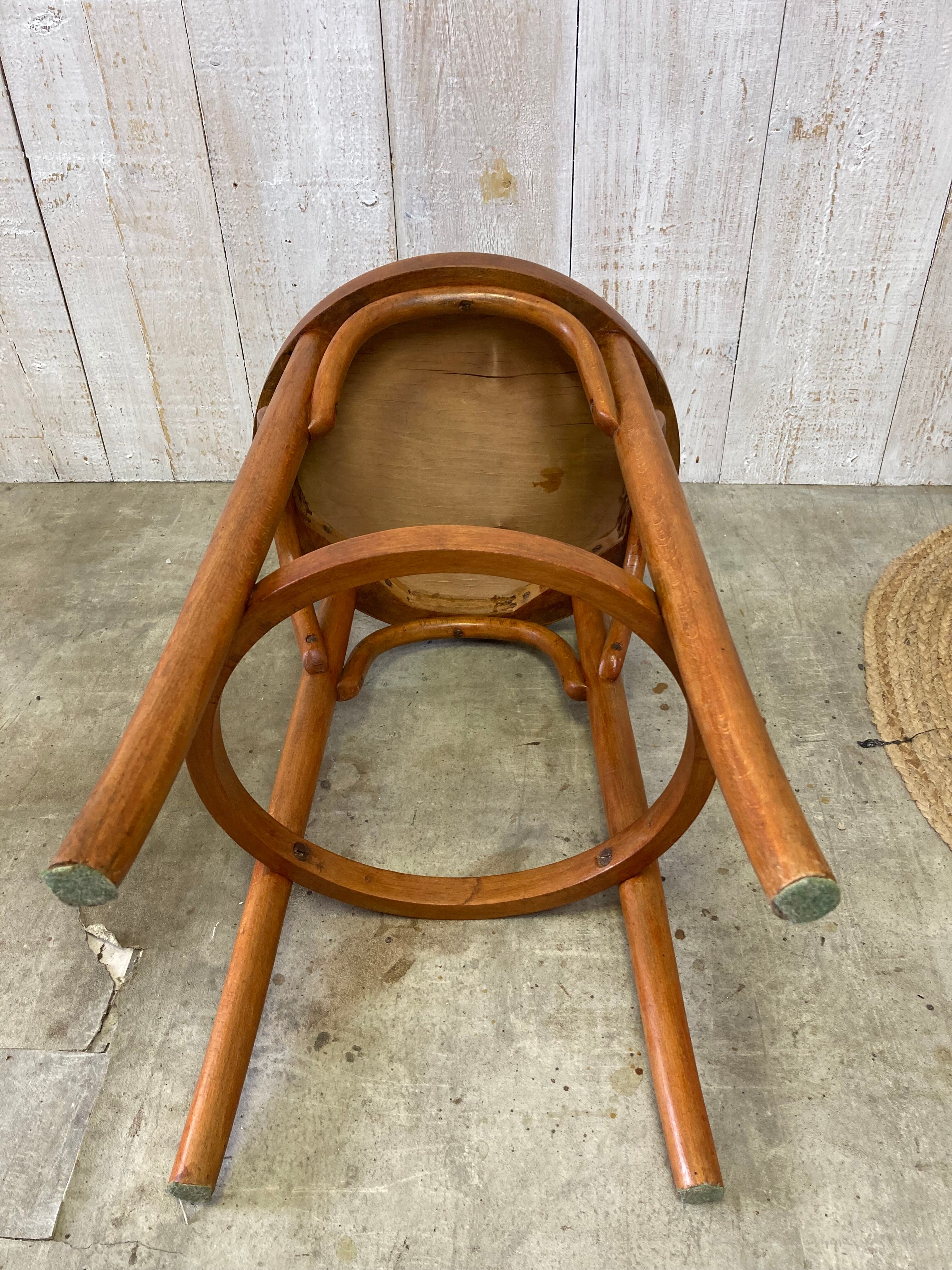 Curved wooden stool