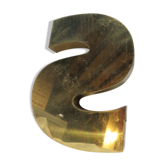 Inverted brass s sign letter