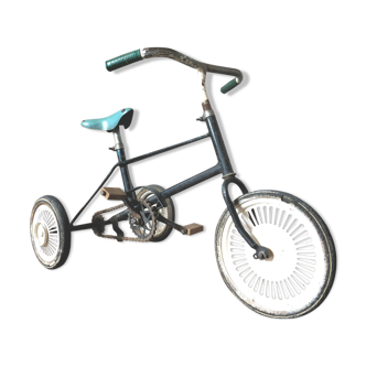 Old metal child tricycle