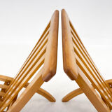 Ensemble de deux chaises pliantes en hêtre, conçues par l'architecte Otto Rothmayer.