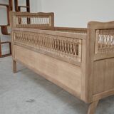 Children's bed in wood and sandblasted rattan from the 1960s.