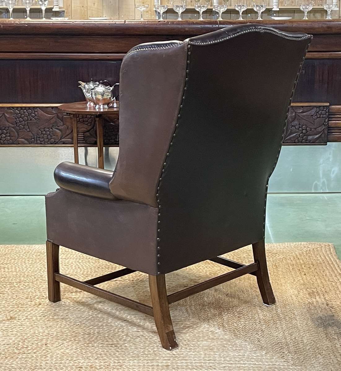 Chesterfield armchair with brown leather ears from the 1990s in very good condition