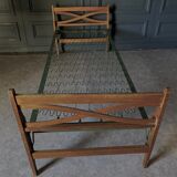 Bed with green metal braces 1960 a person foldable