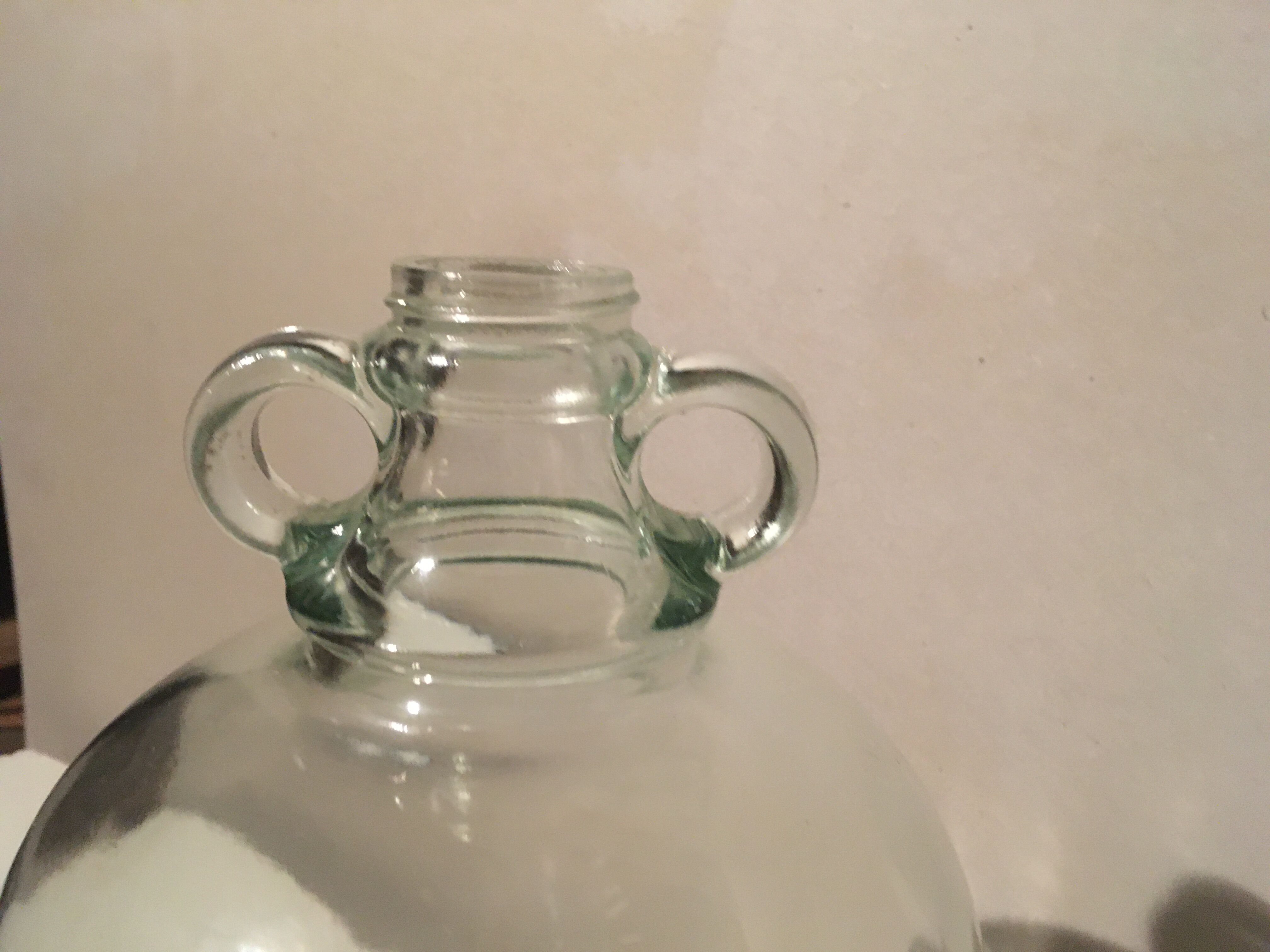 Demijohn in transparent glass