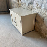 Antique white patinated low cabinet
