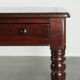 Antique English writing desk from the late 19th century with a warm colour