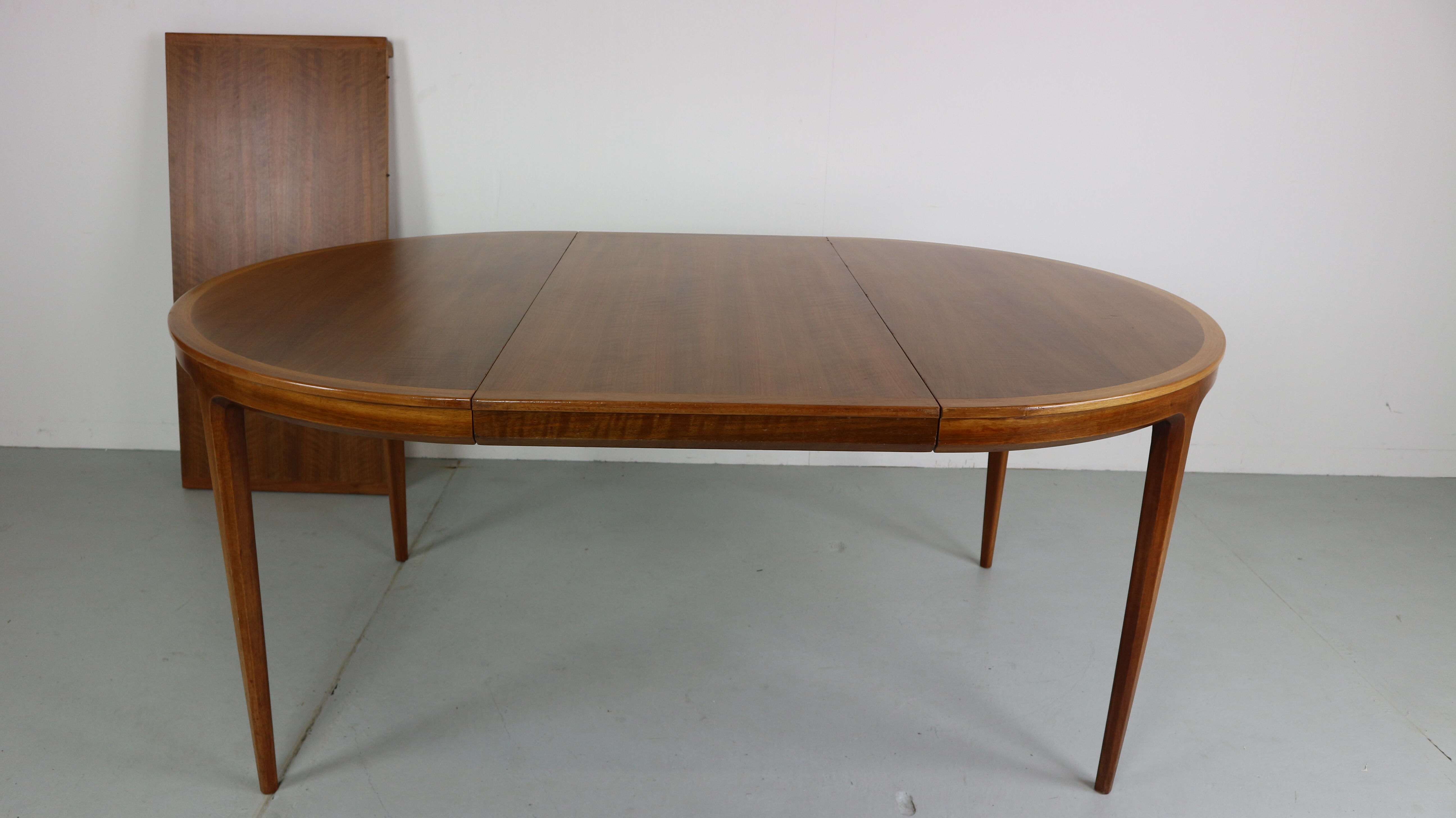 Swedish walnut dining table by B. Fridhagen for Bodafors, 1960s