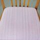 Set of four dining chairs from the 1970s with fabric seat and wooden frame