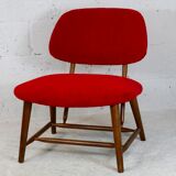 Chauffeuse by Alf Svensson, Model TeVe, published by Ljungs Industrier, Sweden, 1953. Retyped red.