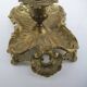 Antique rococo-style hand candlestick in bronze or brass