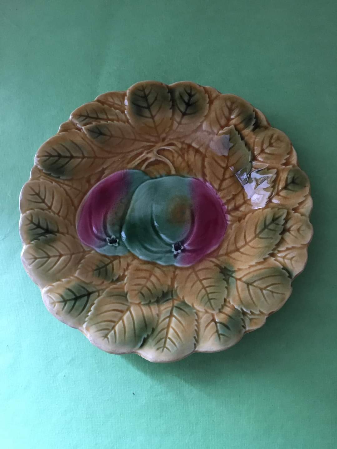 3 slip dessert plates stamped Sarreguemines. Fruit decor.