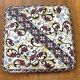 Vintage trivet in Gien earthenware with cornflower decoration.