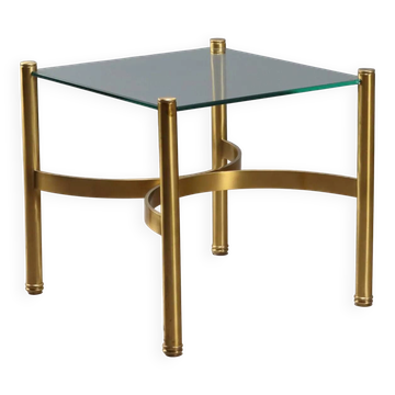 Vintage brass coffee table with glass top, Italian design from the 1970s.